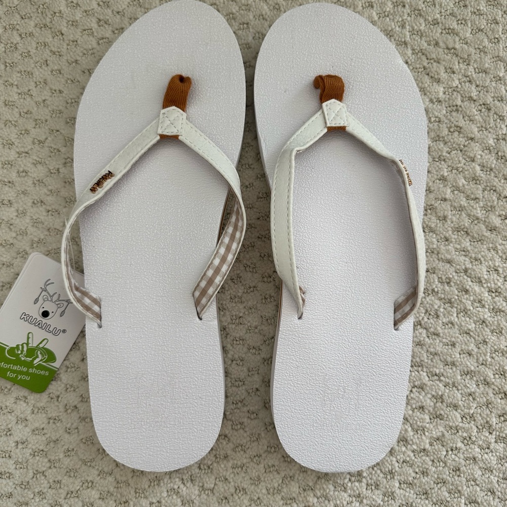 White and Tan Flip Flop Sandals